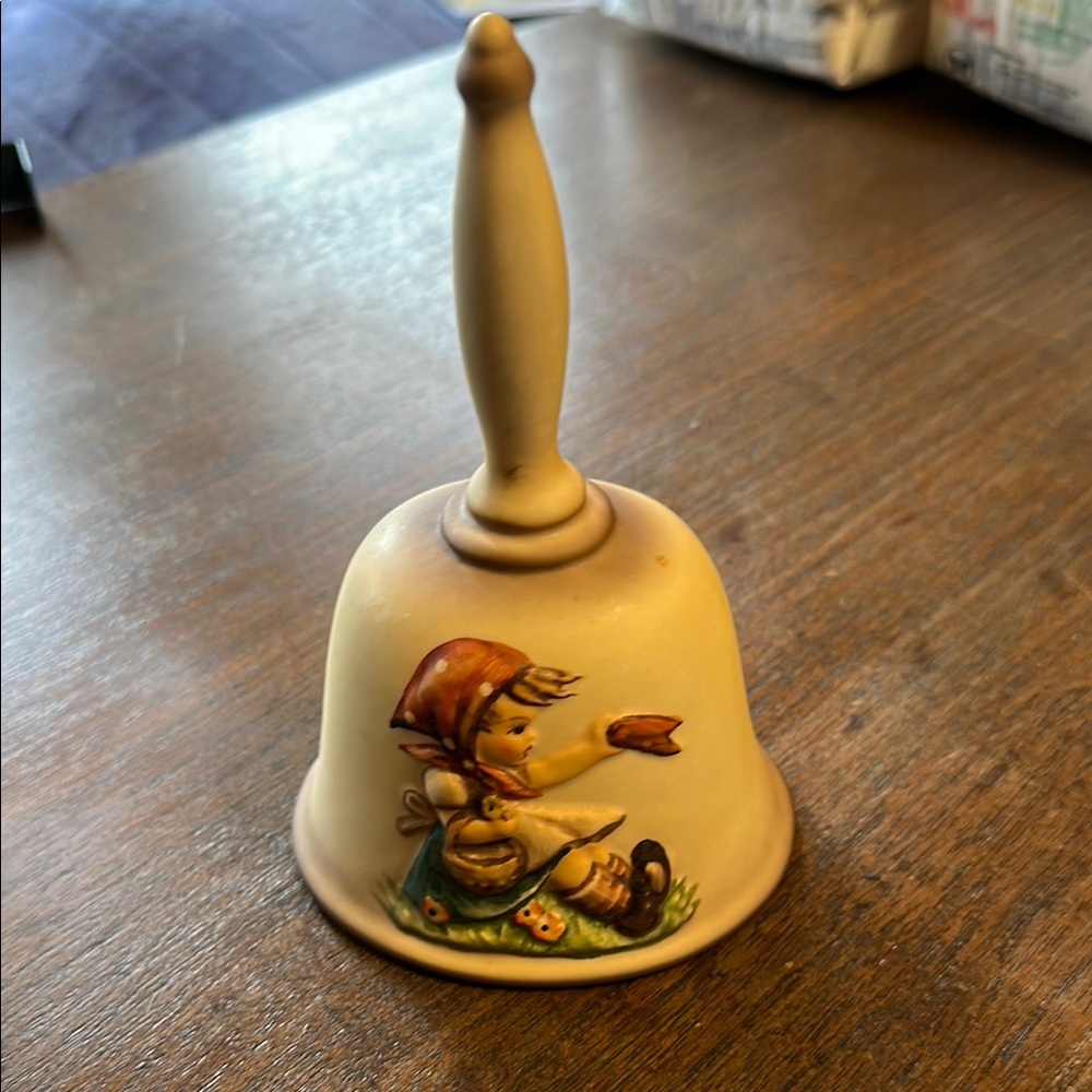 Decorative Cream Bell with Figurine Design